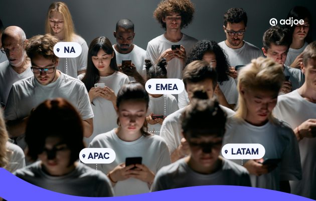 a crowd of people in white clothing looking down at their phones