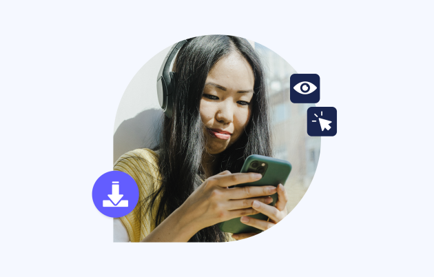 young woman with dark hair looking down at her phone
