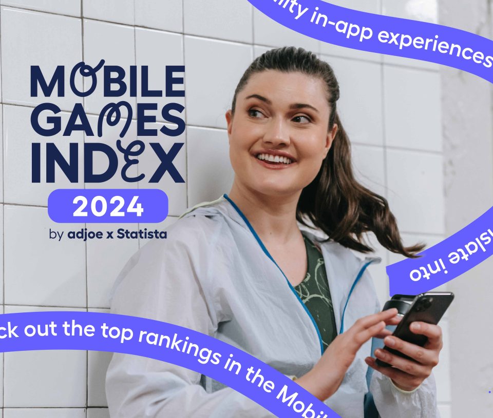 woman smiling on her phone with Mobile Games Index branding icons }}