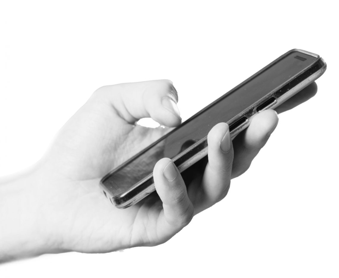 Hand holding smartphone with question: how often do you install a new game on your phone?