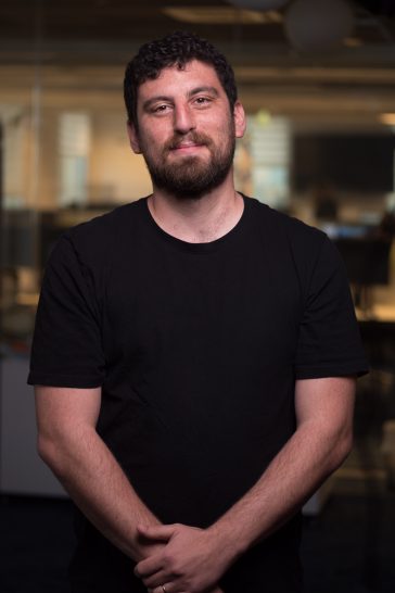 Pini Ashkenazi from Candivore looking and smiling into the camera