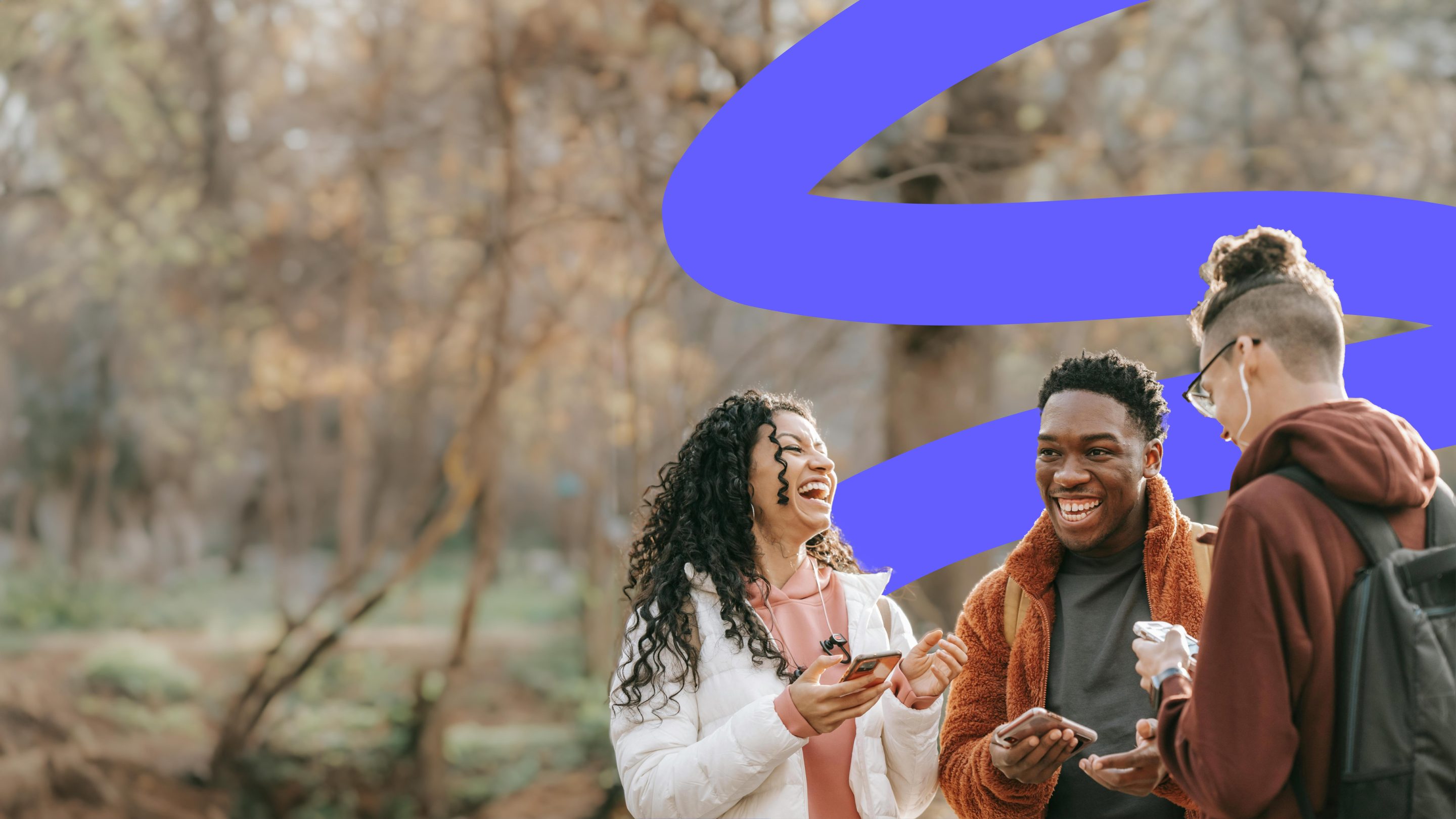 people outside laughing on their phones