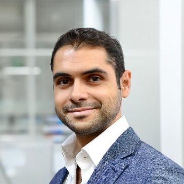 young man smiling into the camera